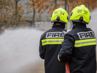 Fire crews called as two sheds go up in flames