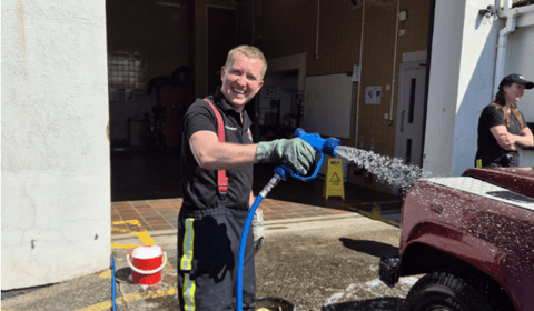 Firefighters raise hundreds for charity with car wash
