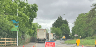 Road closed after two-vehicle collision as air ambulance spotted