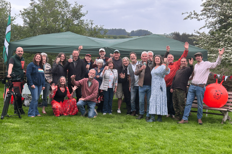 The cast of the Good Life music video: Scorriton villagers and members of Good Vibes Rollercoaster. 