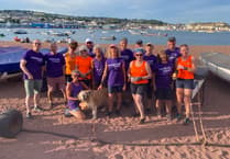 Castle Inn Rowers turn purple for Rowcroft Hospice