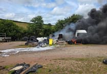 Firefighters tackle blaze at building materials site