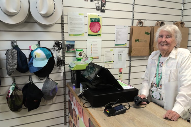 Volunteer Zelah at the Children's Hospice South West charity shop in Teignmouth