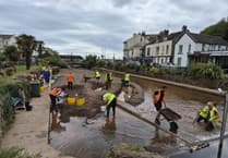 Volunteer teams get to work clearing waterway