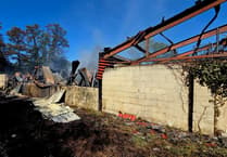 Boss 'devastated' after fire destroys part of business