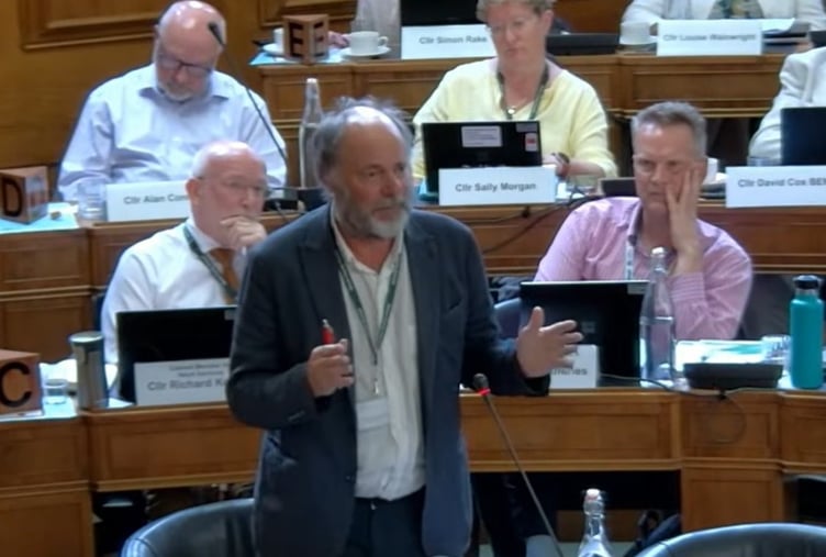 Cllr Julian Brazil speaks during the Devon County Council debate (Image courtesy: Devon County Council/YouTube)