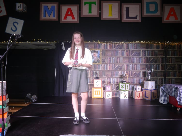 Gracie Murray Coller as Matilda at Kingskerswell C of E Primary School Drama Club's production of Matilda the Musical. Photo supplied