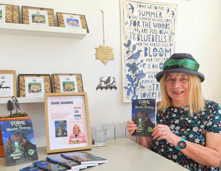 Author Maureen Boon signing copies of her work at First Draft Books in Bovey Tracey