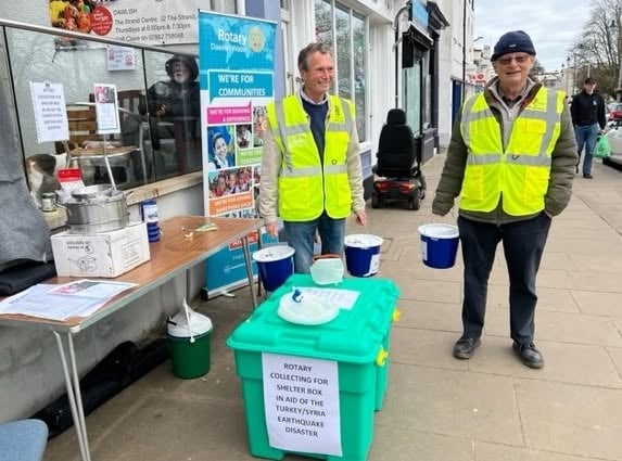 A previous collection for Shelterbox by Dawlish Water Rotary Club with the box the members will push from Teignmouth to Dawlish. Photo Dawlish Water Rotary