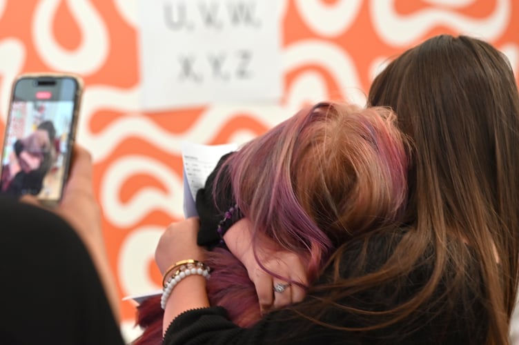 Hugs of elation and relief on GCSE results day at Newton Abbot's Coombeshead Academy. 