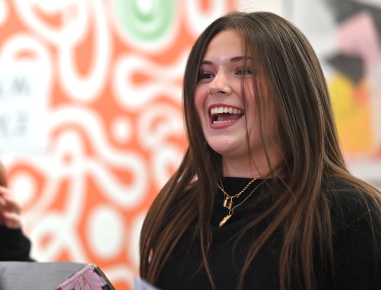 GCSE results day at Newton Abbot's Coombeshead Academy. Lily Eldridge pleased with her results. She'll be starting A-Level studies at the college's 6th Form in September