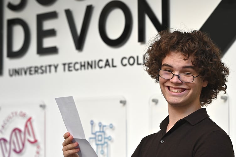 GCSE results day. Students at South Devon University Technical College. Engineering student Oscar Lowther happy with his results. He will be returning to SDUTC in September to continue his engineering studies