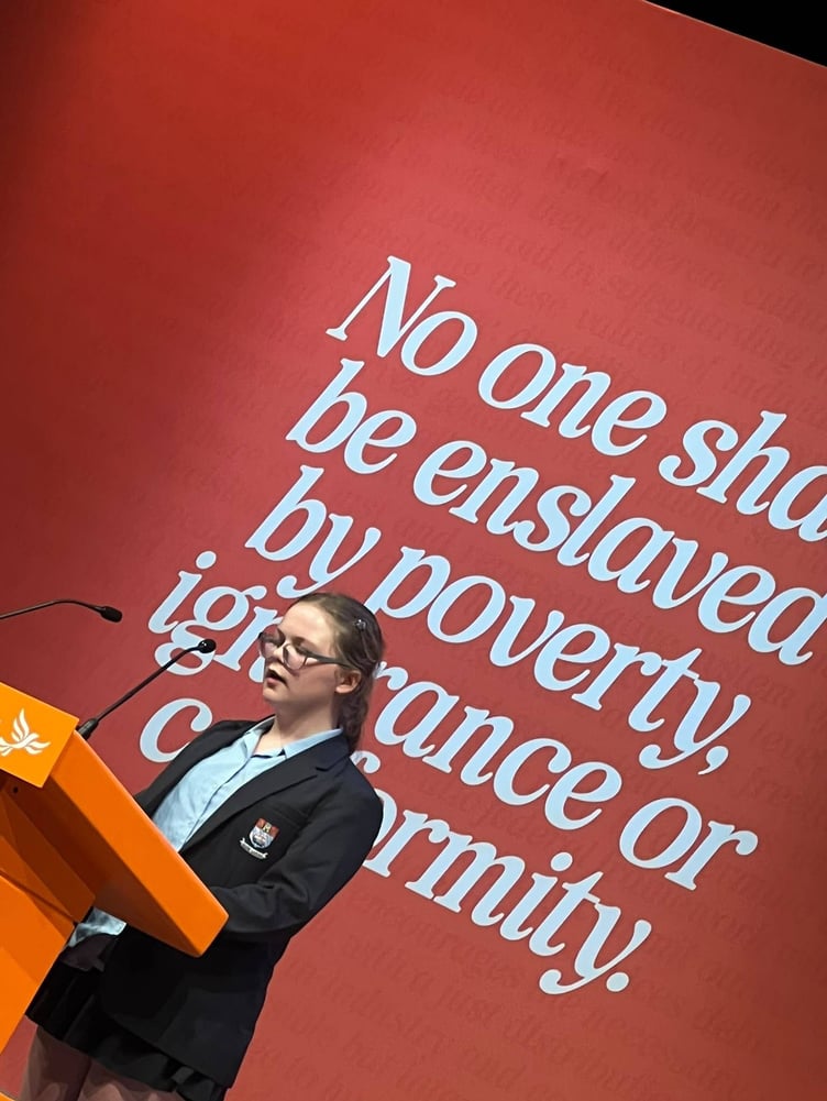 Kitty Dawson, 13, on stage at the Liberal Democrat conference.