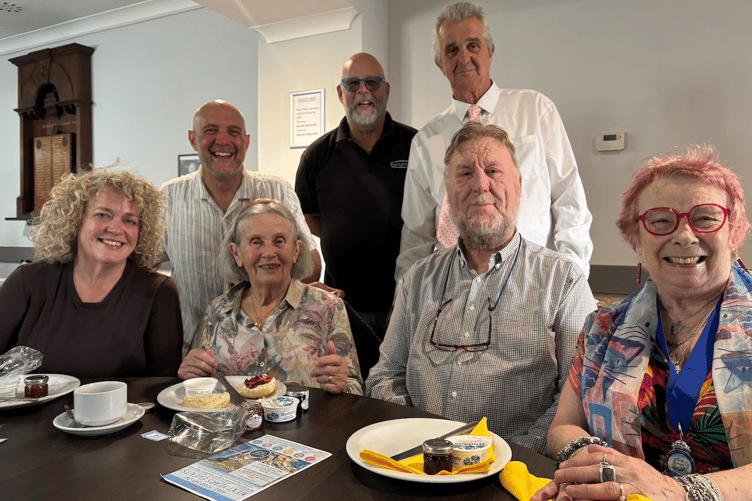 Photo showing attendees of John Pearce's cream tea fundraiser for The Young Ones
