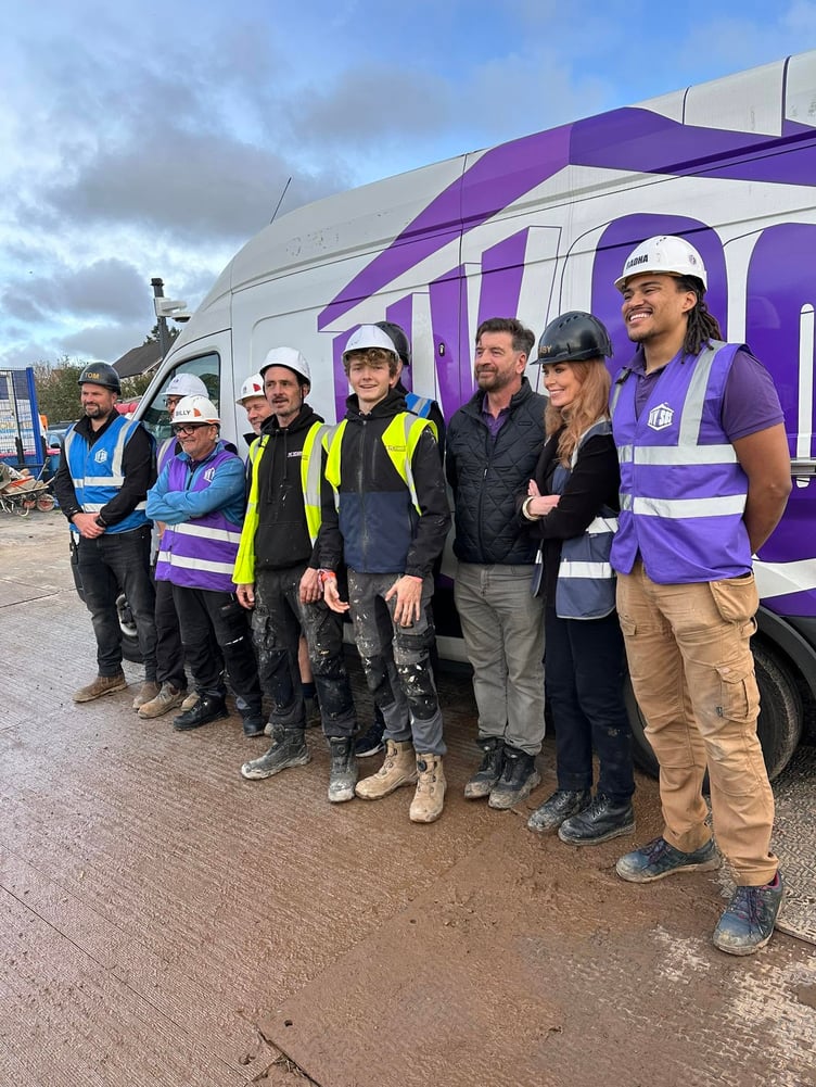 Nigel and Kier Fraser with the DIY SOS team. Photo supplied